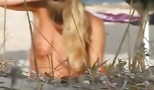 Explicit Voyeur Footage of Beachside Orgies and Lewd Encounters