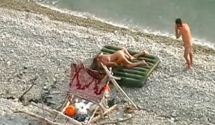 Beachside Peeping Tom Catches a Sunbathing Slut Getting Fucked in the Sand