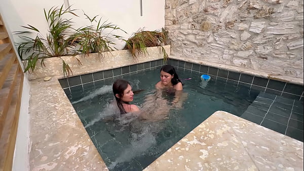 Two Passionate Lesbians Share Deep Desire in Public Pool