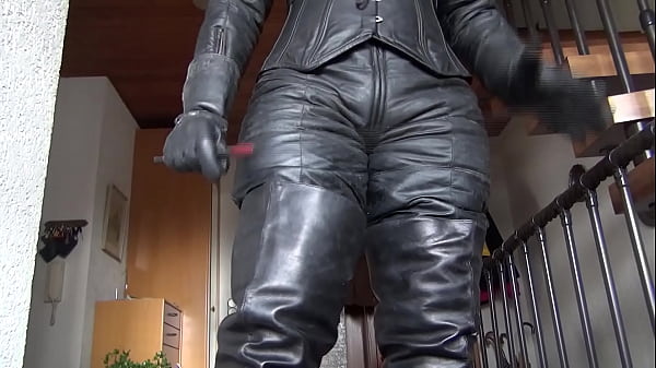 Vintage Biker Domme Enchants in Spellbinding Leather Fantasy